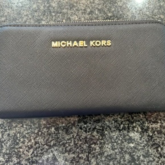 Michael Kors Handbags - Michael Kors Brand New black wallet. Never used.